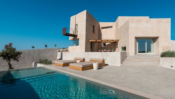 Microcement house facade, terrace floor and microcement swimming pool