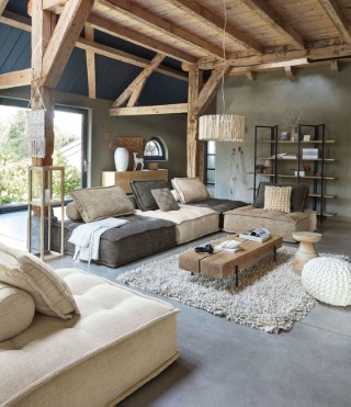 Warm and cosy living room with microcement floor and walls.